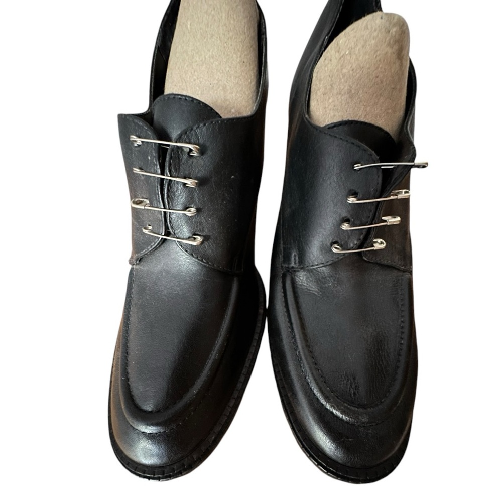 Customized Thom McCain for Goth Wear. Size likely 8 - 8 1/2. Black.